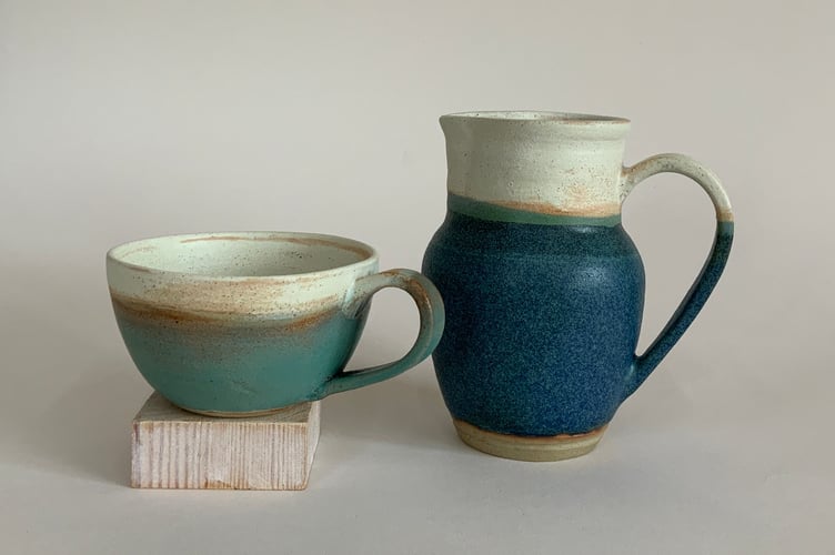 Cosy cup and jug