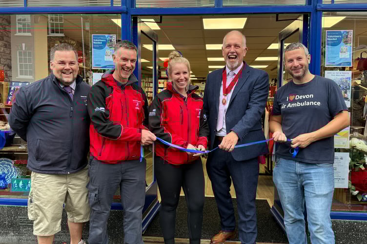 During the ribbon cutting ceremony to open the new Devon Air Ambulance charity shop in Crediton.  AQ 2155
