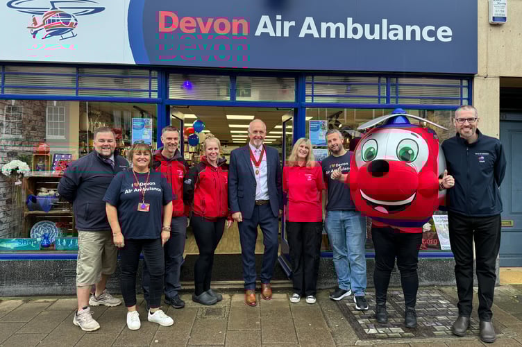 Devon Air Ambulance staff and volunteers with Deputy Mayor of Crediton, Cllr Steve Huxtable before the grand opening of the DAA charity shop in Crediton.  AQ 2149