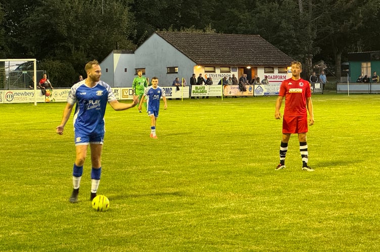 A Crediton player looking to make a pass.  AQ 1844