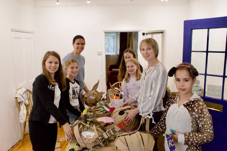 Lola, left, held a mask-making workshop at the gallery