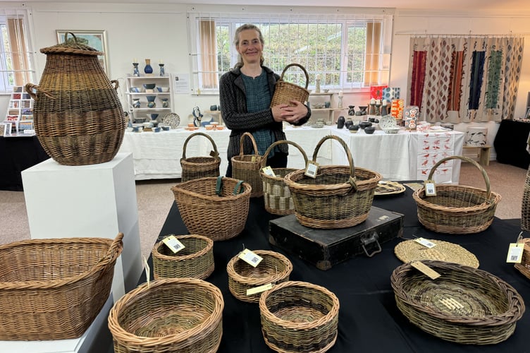 Jane Welsh, basketmaker, exhibited many styles of baskets she has made at The White Room in Crediton.  AQ 2242