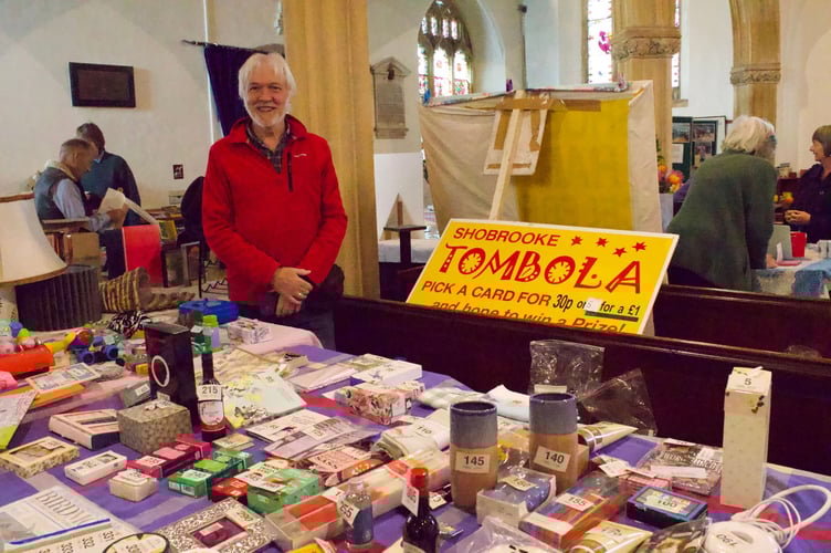Malcolm Cooke running the tombola