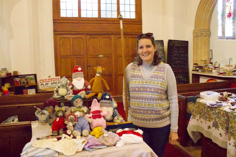Kirsty Brett with her knitted creations