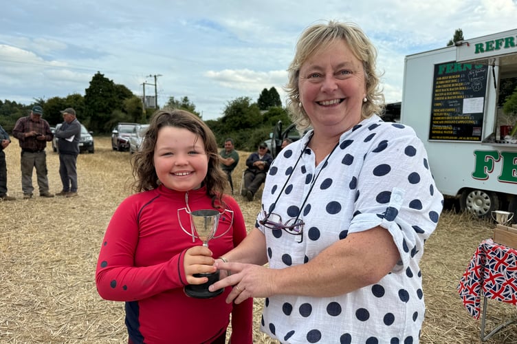 One of the children’s classes winners receiving their trophy. AQ 3176