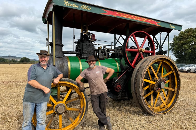 Roy Hebditch, right and Mike Price, left, took along Roy’s 1930’s Wallis and Stevens agricultural traction engine for all to see at the ploughing match.  AQ 3059
