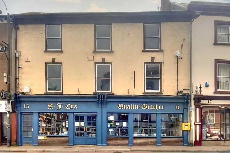 The three-bedroom maisonette is split over two storeys above AJ Cox Butchers