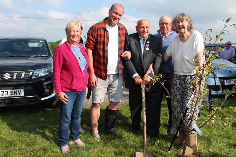 Peter, centre, helped with the tree plant.  SR 9689
