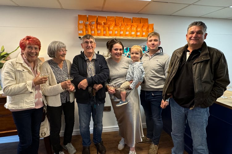 Chloe Burston-Thomas, centre, with some of those who attended the opening evening party. AQ 2618