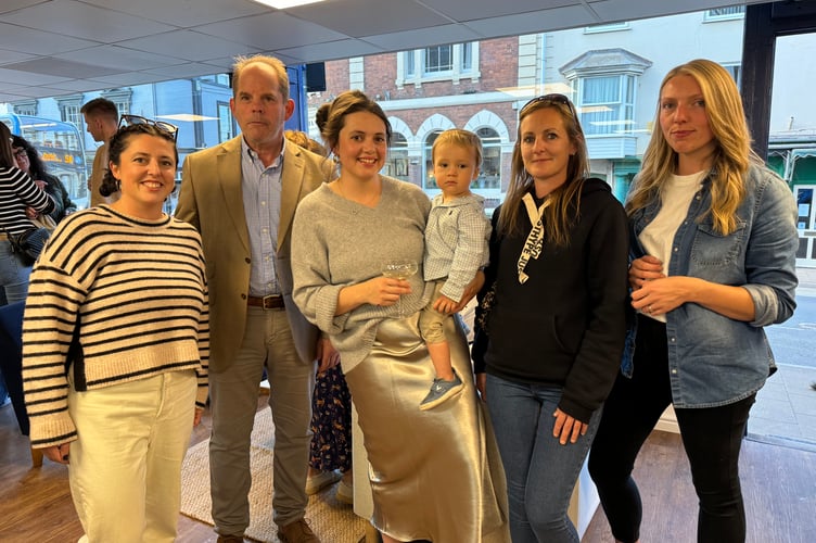 Chloe Burston-Thomas, centre, with guests at the opening evening party. AQ 2626
