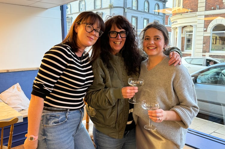 Chloe, right, with guests at the opening evening party. AQ 2628