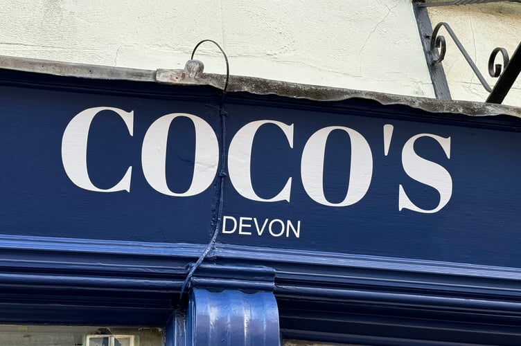 A sign outside the cafe. AQ 2602