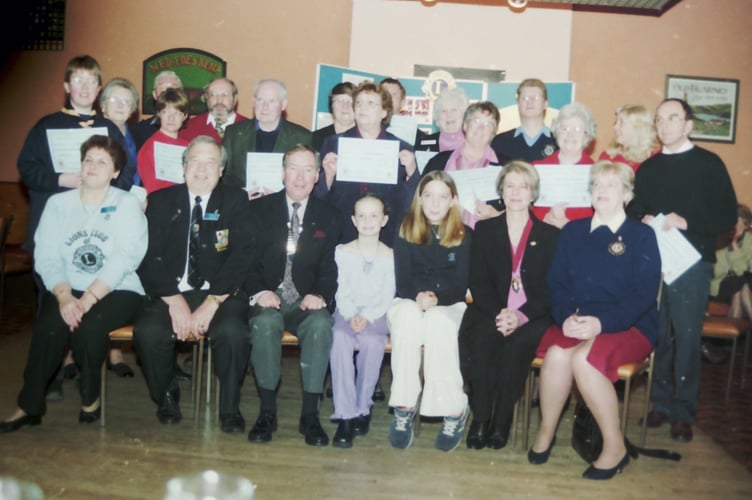 Crediton Lions Club members and Carnival cheque recipients in February 2003. DSC00603