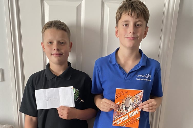Eli Waltho and Finlay Moore with their prizes
