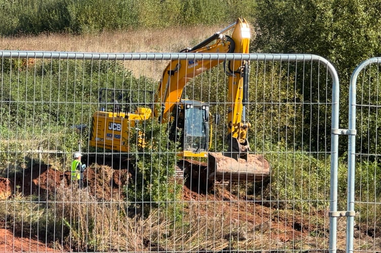 A JCB digger removing earth at the Crediton McDonald’s site. AQ 4475
