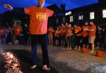 Sign up now to walk over hot coals with Crediton Lions for charity