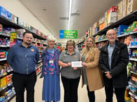 Supermarket donates £8,000 to Age Concern Crediton