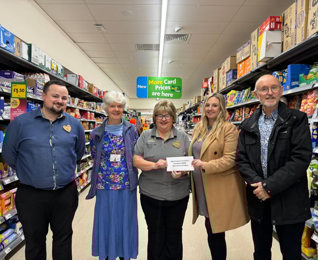 Supermarket donates £8,000 to Age Concern Crediton