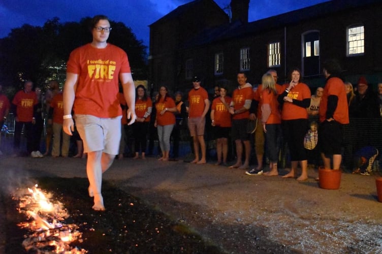 One person walking on the hot coals. Image: FirewalkUK
