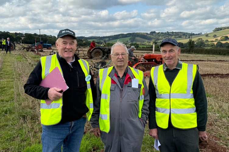 Ed Vigers, Mid Devon ploughing chairman, centre, with two of the judges. AQ 4555
