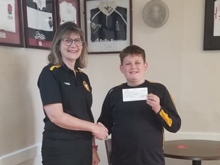 Brennan (11), raised £615 for rugby tour
