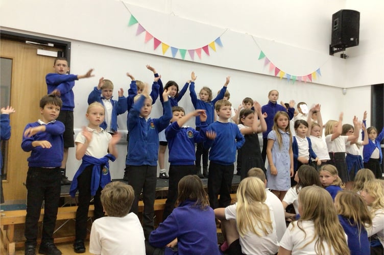 Actions were included in the song sung by this classroom for the Harvest Festival at Cheriton Fitzpaine Primary School.
