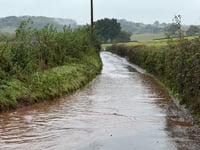Floods trap cars, shut roads in Crediton area