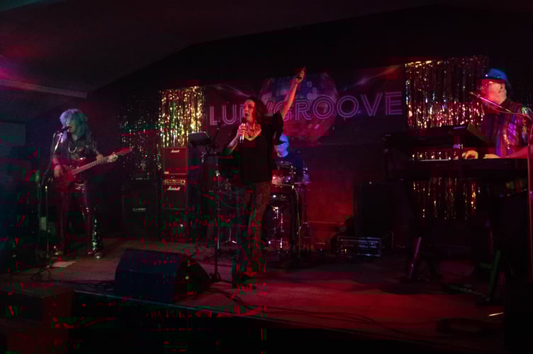 The band LurvGroove at the Sandford School fundraiser.