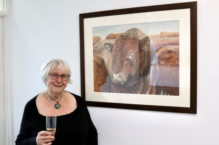 Janet Jarvis with cattle painting