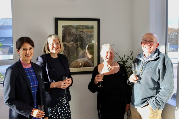 From left, Nysha Forsey, Rebecca Cox, Janet Jarvis, Steve Jarvis at the exhibition