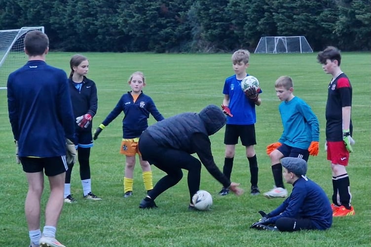 Gillian from GK316 Academy training Crediton Youth FC goal keepers at a recent training event.
