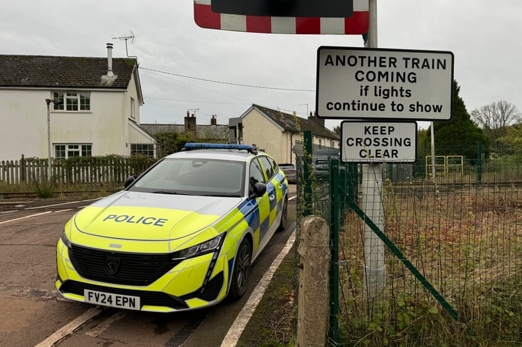 Police are at the scene at Salmonhutch Railway Crossing. AQ 5924