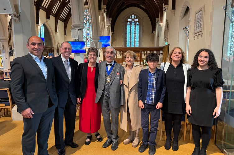 Mid Devon District Council Chairman, Cllr Frank Letch and Cllr Mrs Natalia Letch, fourth and fifth left, with members of the Letch family at the service. AQ 5747