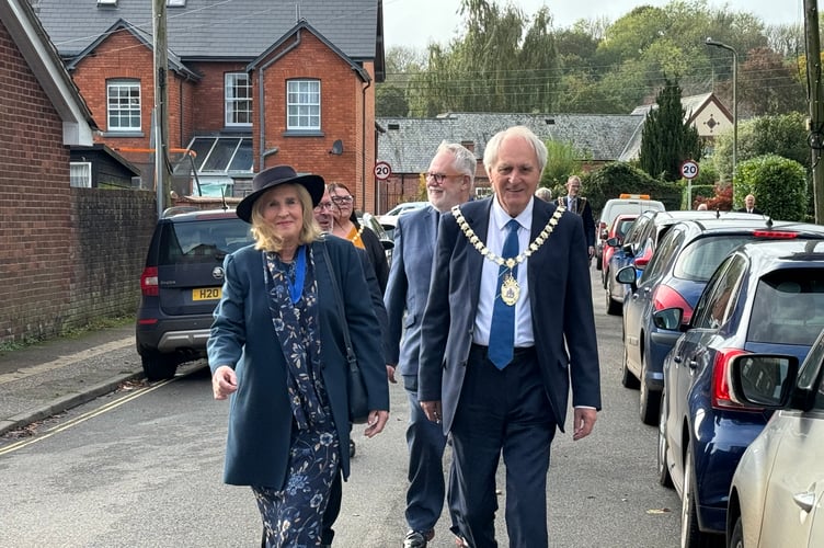 The chairman of Devon County Council, Cllr John Hart and Mrs Rita Hart, during the procession to the church.  AQ 5768
