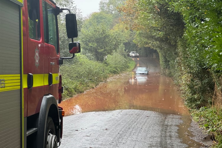 The car which became stuck in floods on the Crediton to Sandford road.  AQ 5419
