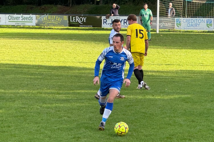 A Crediton United player in possession. AQ 6329