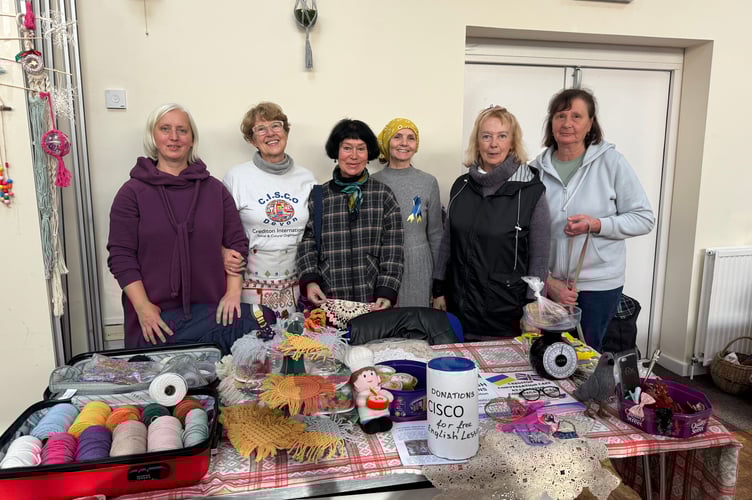 CISCO, Crediton International Social, Cultural Organisation, had a stall raising funds for English lessons.  AQ 6181

