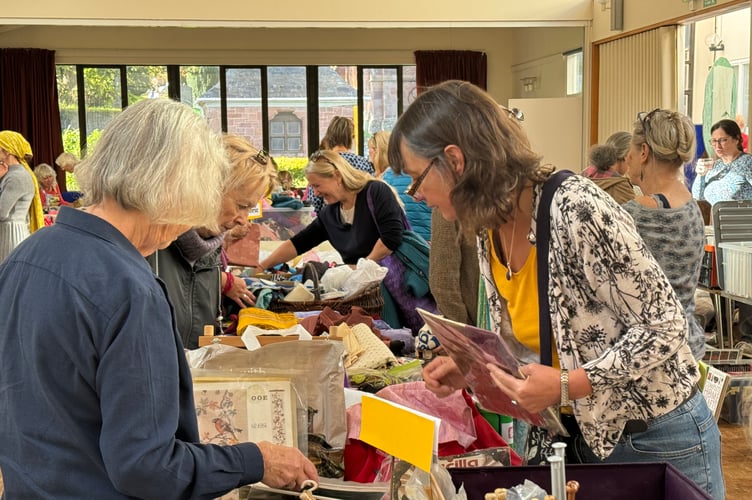 Looking at craft items at the Eco Crafternoon. AQ 6177