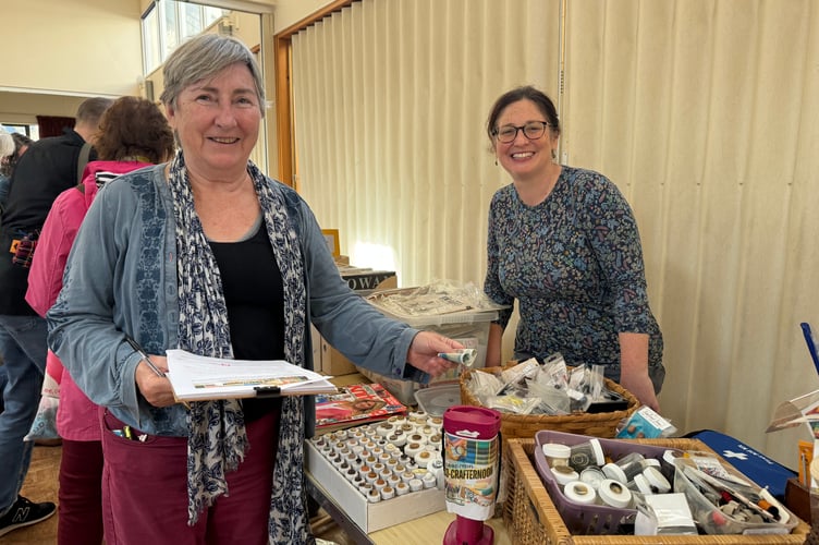 Catherine West, from Significant Seams, right, serving a customer at the Eco Crafternoon.  AQ 6191
