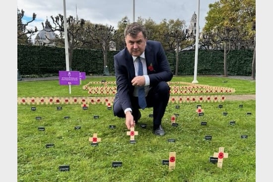 Mel Stride, MP for Central Devon, placing his constituency’s cross in the Constituency Garden of Remembrance.