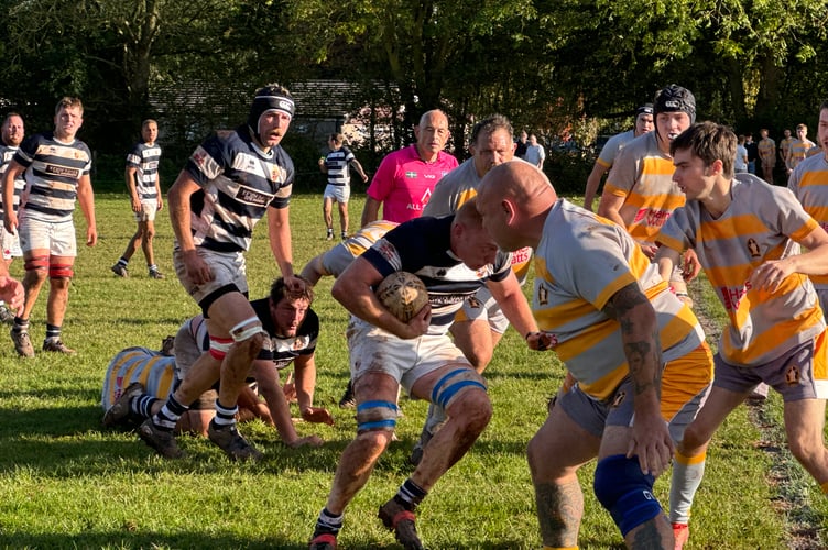 Crediton Thirds made sure there was no way through for an Ilfracombe player. AQ 6282