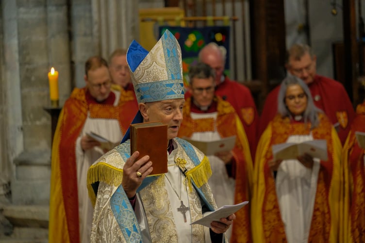 Bishop Mike with Bible.
