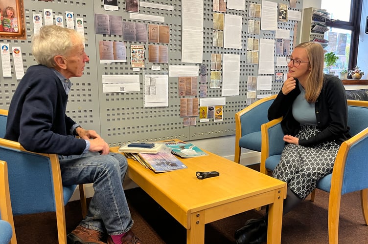 Project Co-ordinator, Izzy FitzGerald, right, interviews Paul Cleave about his memories.