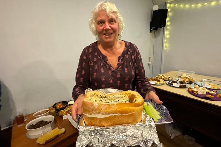 Jill Kinch with her Spinach Loaf which was greatly enjoyed at the book launch at The Lamb Inn, which is featured on page 25 in the book.  AQ 6730