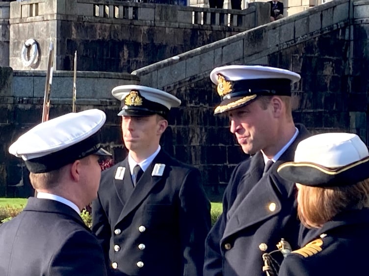Prince William chatting to the officer recruits during their passing out ceremony at Dartmouth's Naval College in December 2023