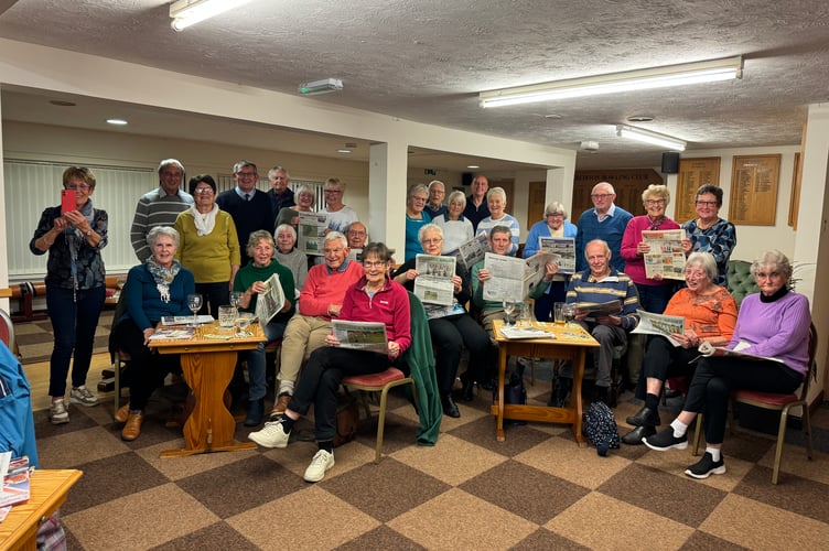 ‘Crediton Courier’ Editor Alan Quick, with some of the members of Crediton Bowling Club following his talk about the newspaper. AQ 6097