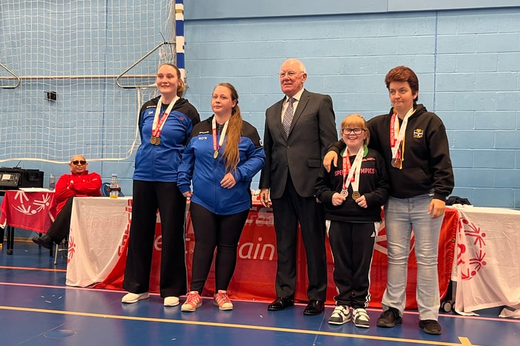 Dee, second right, with her doubles partner Nikki from Cornwall after winning Silver in the Ladies Doubles at the Special Olympics Badminton Nationals.
