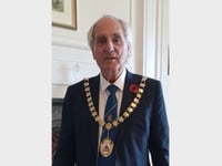 Political veteran steps down day before 80th birthday