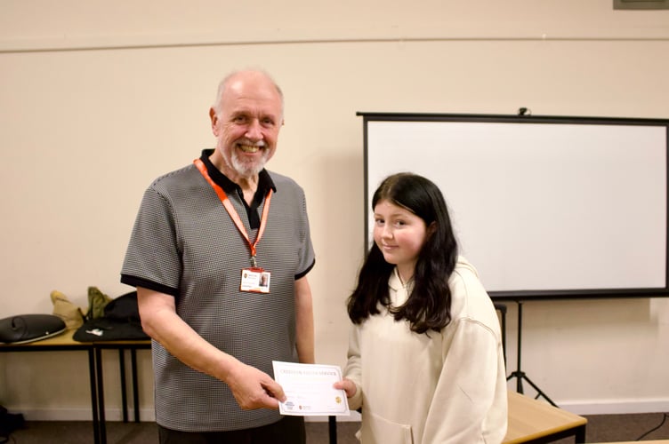 Mia Morgan receiving her Crediton Youth Service award from Deputy Mayor Steve Huxtable