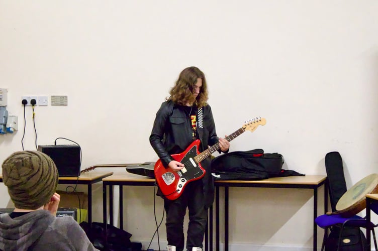 Showing off electric guitar skills